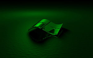 Glowing Green 3D Windows Logo Emblem on Dark Textured Surface HD wallpaper