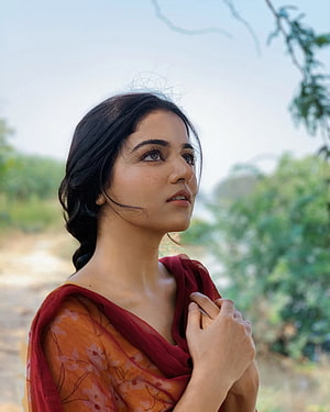 Wamiqa Gabbi in Traditional Orange and Red Attire with Natural Outdoor Background HD phone wallpaper