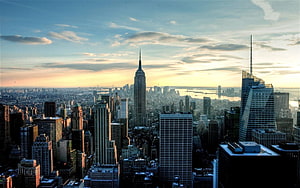Aerial View of the New York City Skyline Featuring the Empire State Building at Golden Hour HD wallpaper