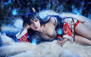 Ahri Cosplay Portrait with Fox Ears and Blue Magic Effects on White Fur HD wallpaper