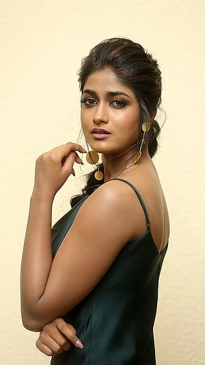 Dimple Hayathi in a dark green satin dress with gold disc earrings HD phone wallpaper