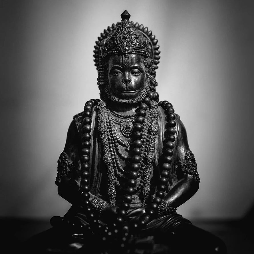 Black and White Hanuman Statue with Ornate Crown and Prayer Beads HD phone wallpaper