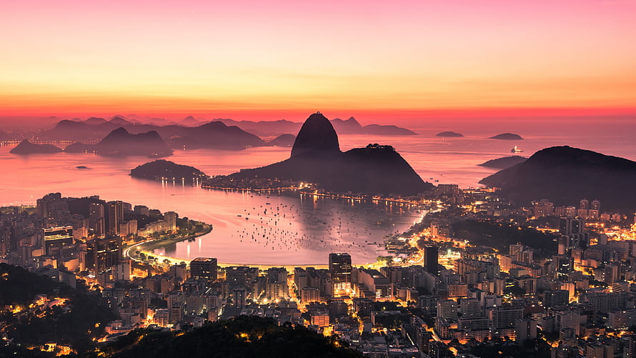 Rio De Janeiro skyline at sunrise with Sugarloaf Mountain and Guanabara Bay HD wallpaper