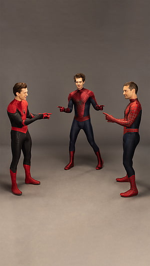 Three Spider-Man Actors Pointing at Each Other in Studio Setting HD phone wallpaper
