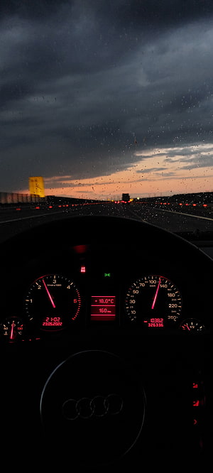 Audi A4 B6 Dashboard View on a Rainy Highway at Dusk HD phone wallpaper