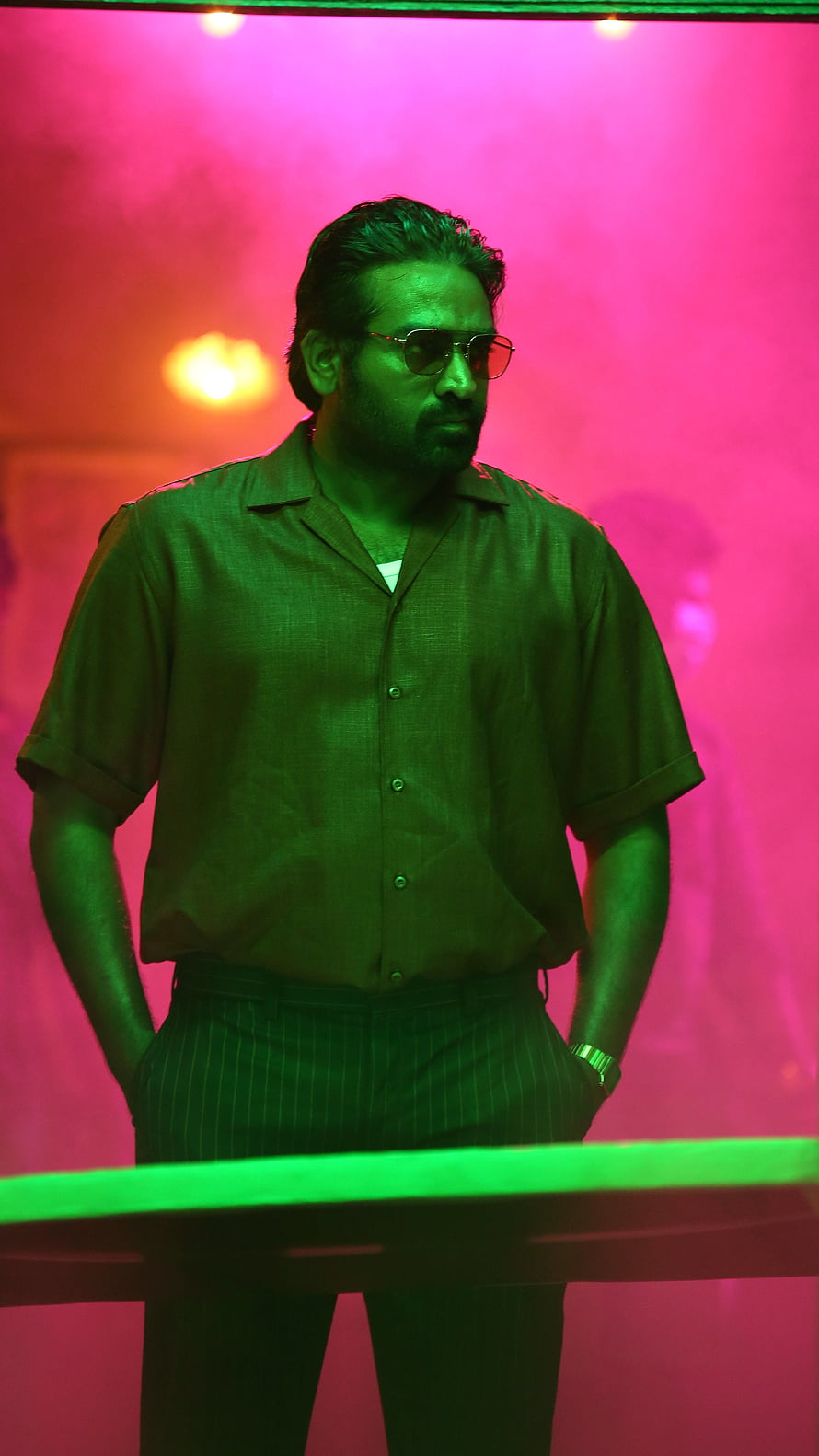 Vijay Sethupathi in Vikram with neon pink and green cinematic lighting HD phone wallpaper