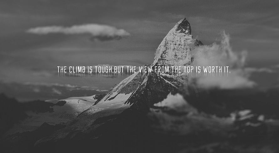 Black and White Snow-Capped Mountain Peak with Motivational Quote Overlay HD wallpaper