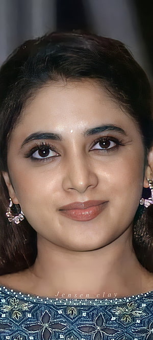 Priyanka Arul Mohan Portrait in Blue Embroidered Attire with Floral Earrings HD phone wallpaper