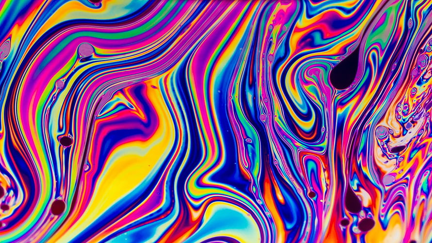 Vibrant Psychedelic Fluid Art with Swirling Rainbow Colors and Abstract Patterns HD wallpaper