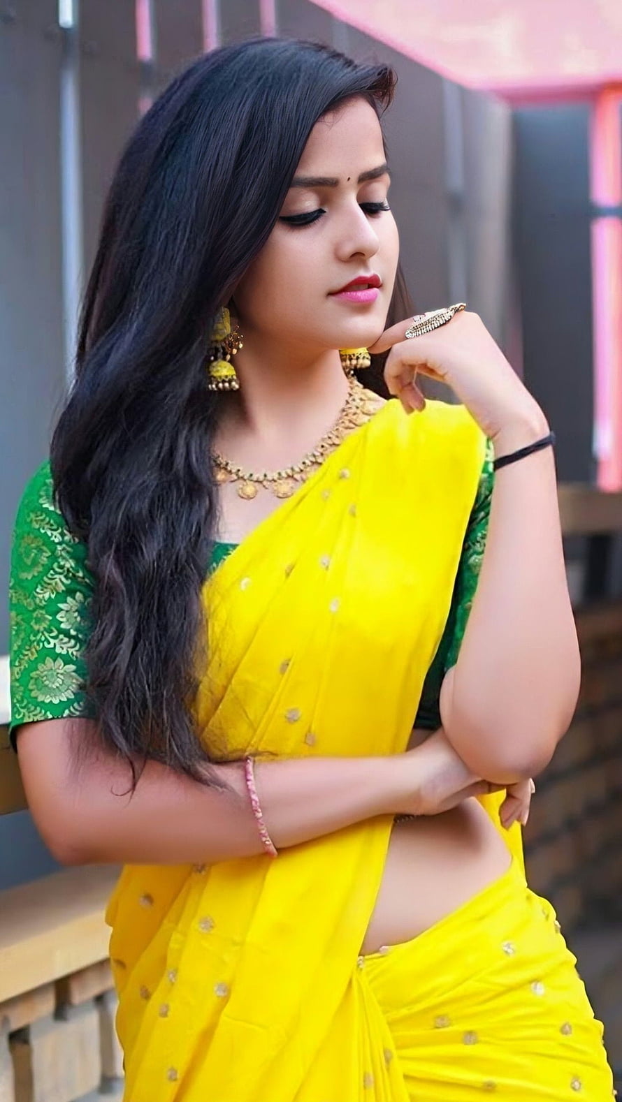 Vaishnavi Chaitanya in Vibrant Yellow Saree with Green Blouse and Gold Jewelry HD phone wallpaper
