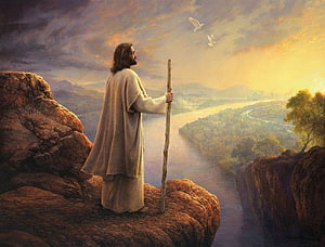 Jesus as the Good Shepherd Standing on a Rocky Cliff Overlooking a Valley HD wallpaper