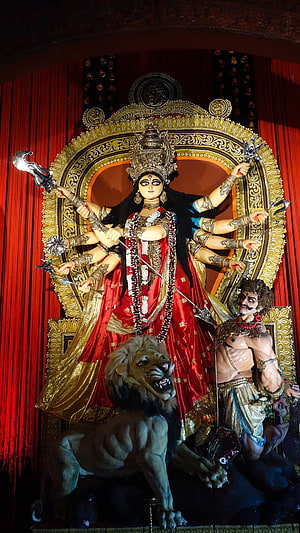 Goddess Durga with Lion and Demon Statue in Traditional Bengali Art Style HD phone wallpaper