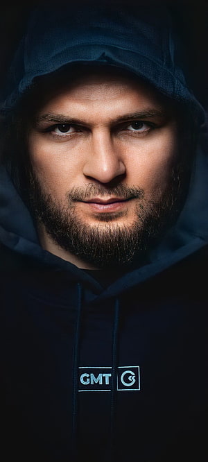 Khabib Nurmagomedov Intense Portrait in Dark Hoodie with UFC Branding HD phone wallpaper