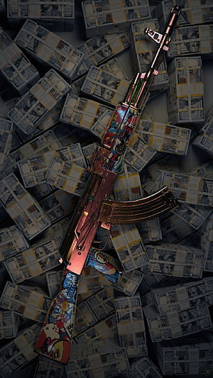 Custom Painted AK-47 Rifle Resting on Stacks of US Dollar Bills HD phone wallpaper