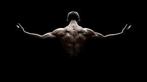 Muscular Male Back View With Star Tattoos Against Black Background HD wallpaper