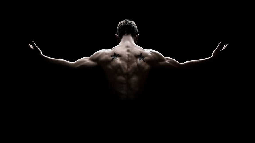 Muscular Male Back View With Star Tattoos Against Black Background HD wallpaper