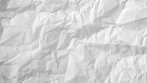 Crumpled White Paper Texture with Soft Shadows and Folds HD wallpaper