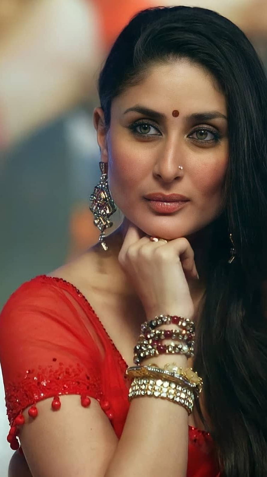 Kareena Kapoor in Red Saree with Traditional Indian Jewelry and Pensive Expression HD phone wallpaper