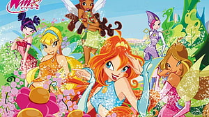 Winx Club Fairies in Vibrant Garden with Sparkles and Flowers HD wallpaper