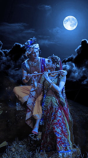Radha Krishna Playing Flute Under Full Moon in Traditional Indian Attire HD phone wallpaper