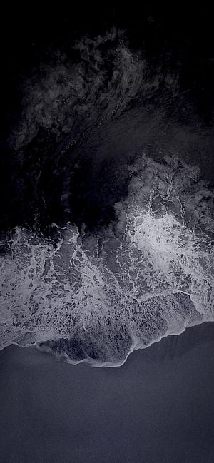 Monochrome Aerial View of Dark Ocean Waves Crashing on Shore HD phone wallpaper