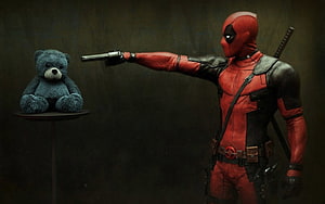 Deadpool Aiming Pistol at Teddy Bear in Dark Cinematic Scene HD wallpaper