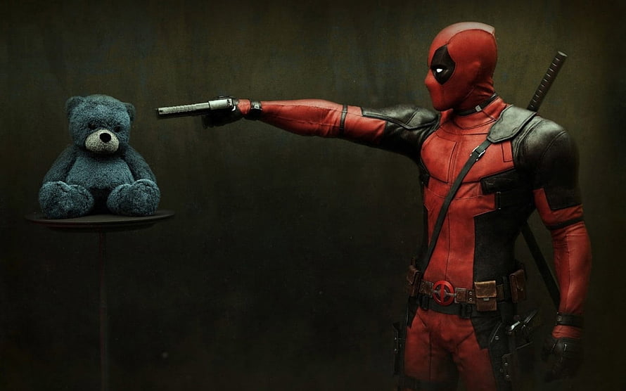 Deadpool Aiming Pistol at Teddy Bear in Dark Cinematic Scene HD wallpaper