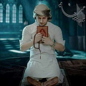 Muslim Man in White Thobe Praying with Quran and Tasbih in a Mosque HD phone wallpaper