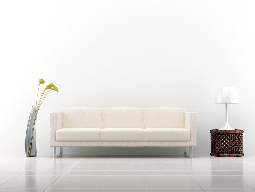Minimalist White Living Room With Modern Sofa, Table Lamp, And Tall Glass Vase HD wallpaper