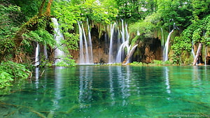 Emerald Waterfall Pool in Lush Tropical Jungle with Turquoise Water HD wallpaper