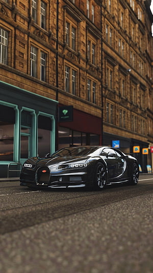 Black Bugatti Chiron Supercar Parked on a City Street with Historic Architecture HD phone wallpaper