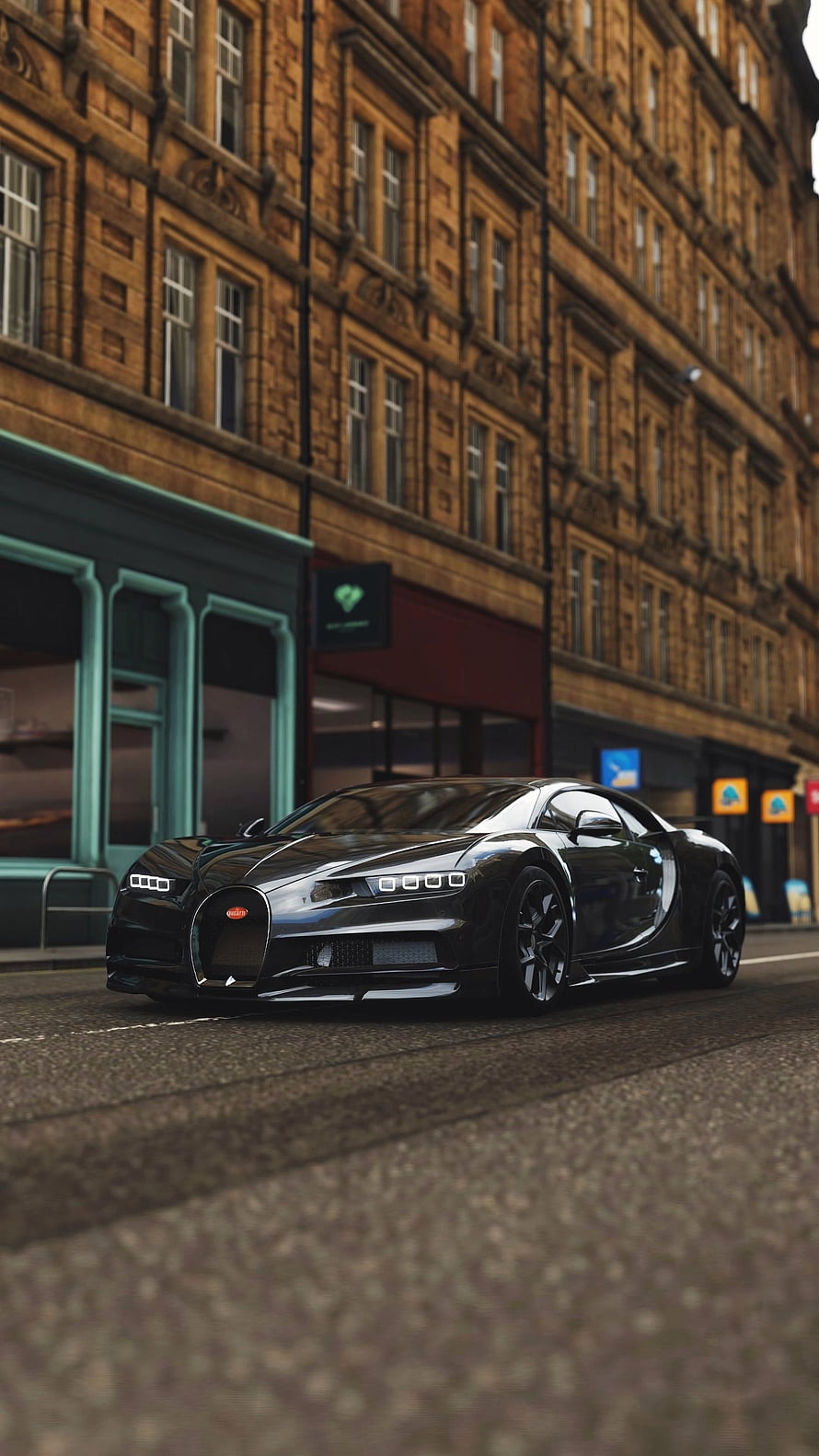 Black Bugatti Chiron Supercar Parked on a City Street with Historic Architecture HD phone wallpaper