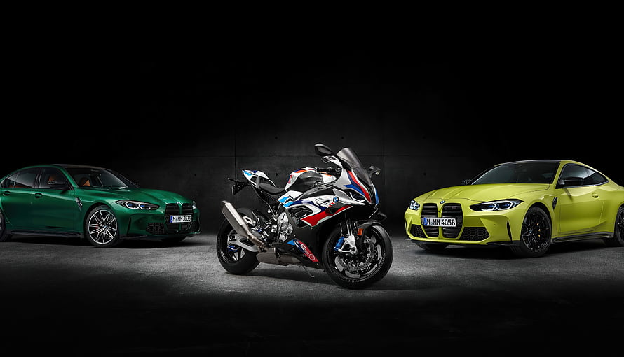 BMW M Performance Lineup Featuring M3 Sedan, M4 Coupe, and S1000RR Motorcycle HD wallpaper