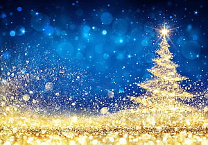 Golden Sparkling Christmas Tree with Glittering Dust on a Deep Blue Background HD wallpaper