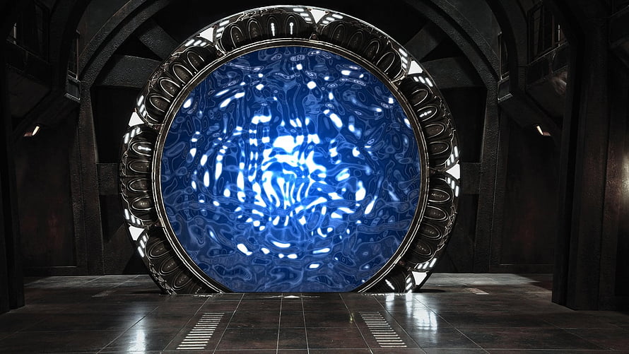 Stargate Portal in Dark Industrial Chamber with Glowing Blue Energy Core HD wallpaper