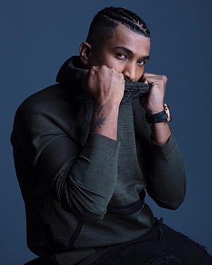 Divine Rapper Studio Portrait in Dark Hoodie HD phone wallpaper