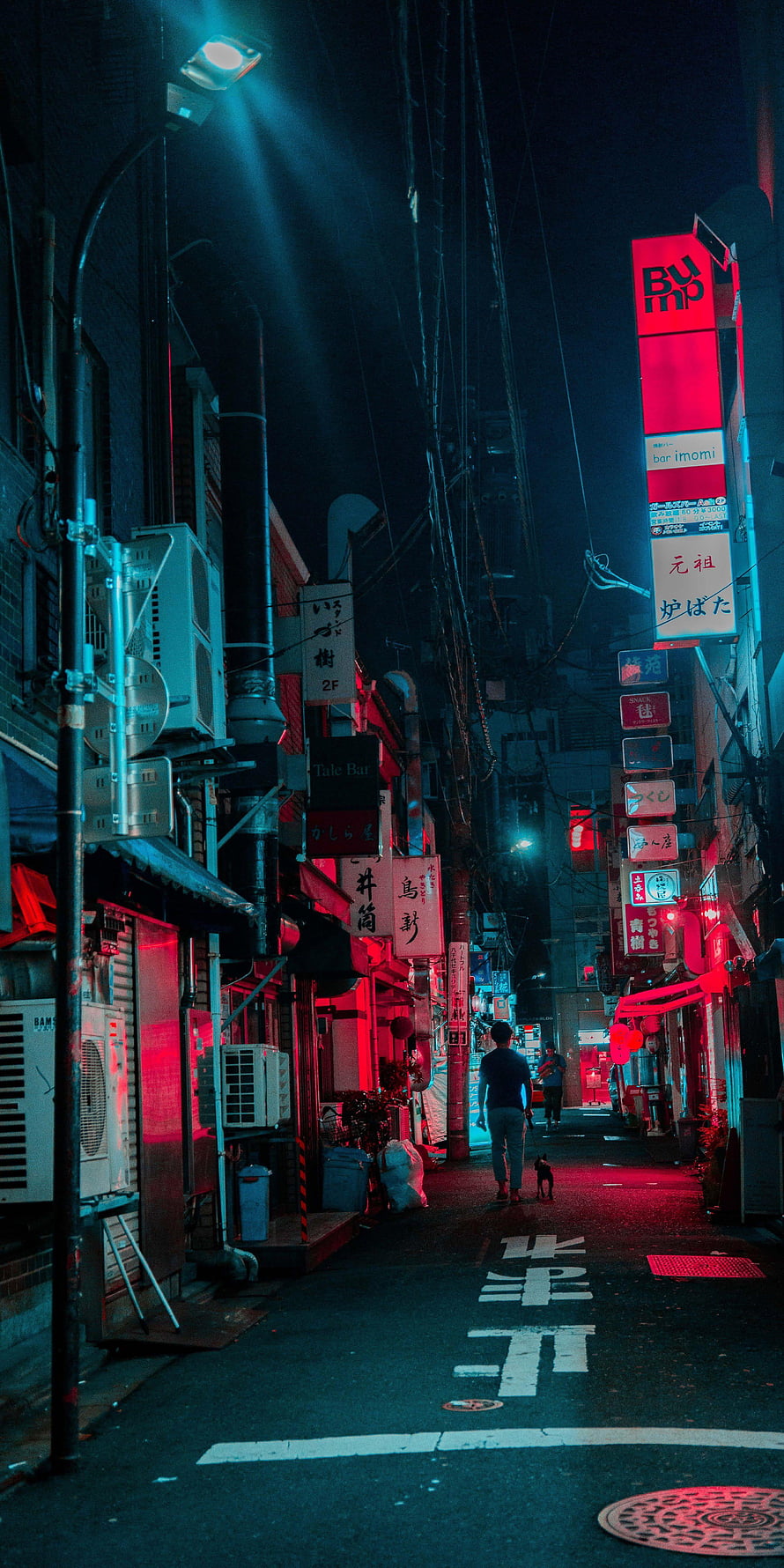 Neon-lit Japanese alleyway at night with a lone figure and dog walking through a cyberpunk cityscape HD phone wallpaper