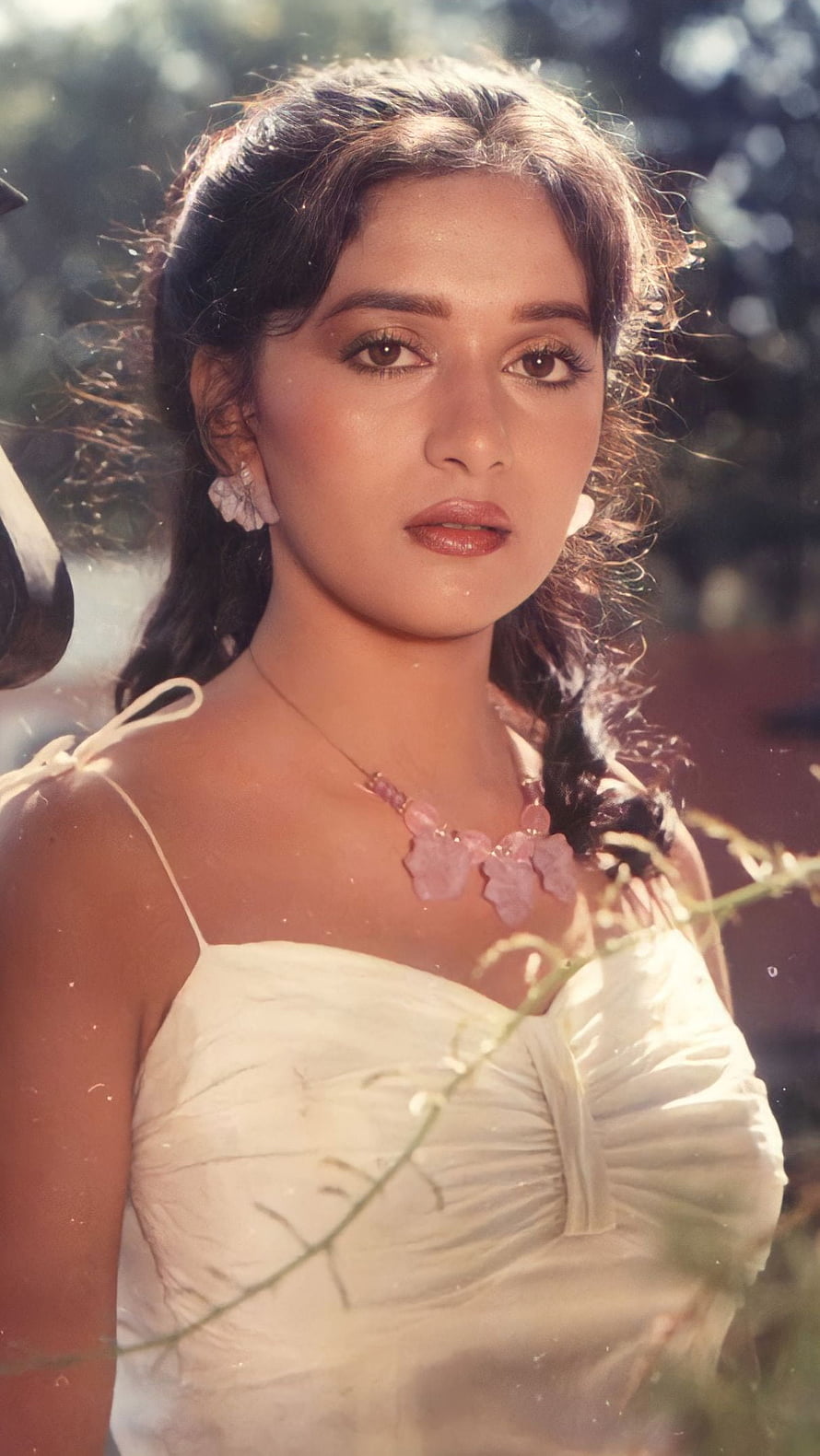 Madhuri Dixit in a White Dress with Floral Necklace and Earrings in Soft Natural Light HD phone wallpaper