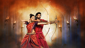 Baahubali 2 The Conclusion: Devasena and Baahubali Aiming Bows in a Grand Hall HD wallpaper