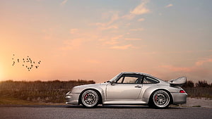 Silver Porsche 993 GT2 Widebody Coupe Parked on Coastal Road at Sunset HD wallpaper