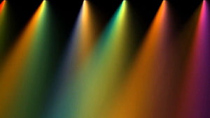 Vibrant Multicolored Stage Spotlights Beams Against Dark Background HD wallpaper