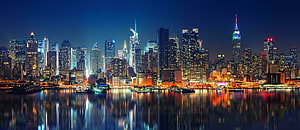 New York City Manhattan Skyline at Night with Waterfront Reflections HD wallpaper
