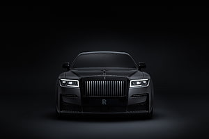 Rolls-Royce Black Badge Ghost Front View in Dark Studio Setting HD wallpaper