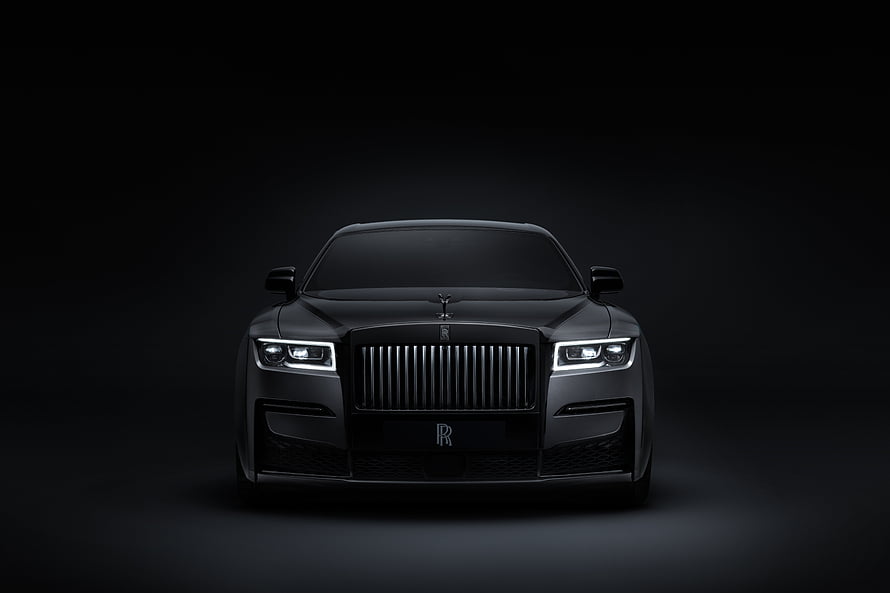 Rolls-Royce Black Badge Ghost Front View in Dark Studio Setting HD wallpaper