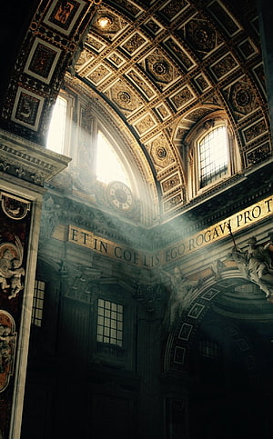 Ornate Baroque Cathedral Interior with Gilded Vaulted Ceiling and Dramatic Light Beams HD phone wallpaper