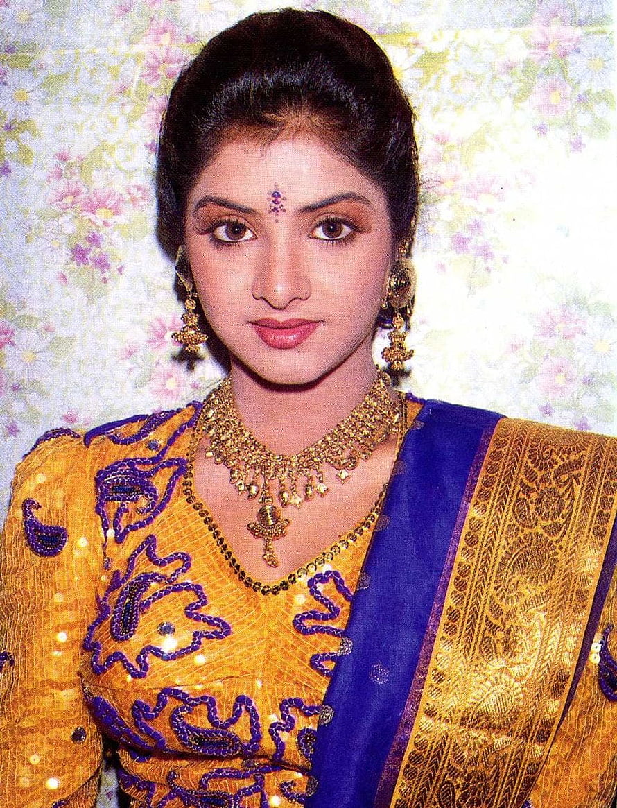 Divya Bharti in Traditional Indian Saree with Gold Jewelry and Floral Backdrop HD phone wallpaper