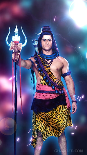Lord Shiva in tiger skin dhoti holding trident and snake necklace with cosmic background HD phone wallpaper