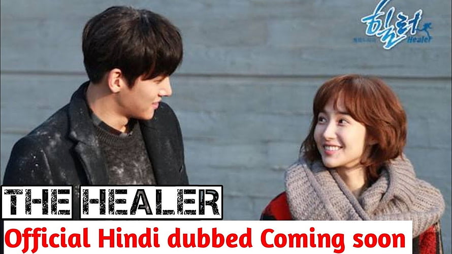 The Healer Korean Drama Couple Scene with Winter Scarf and Urban Backdrop HD wallpaper
