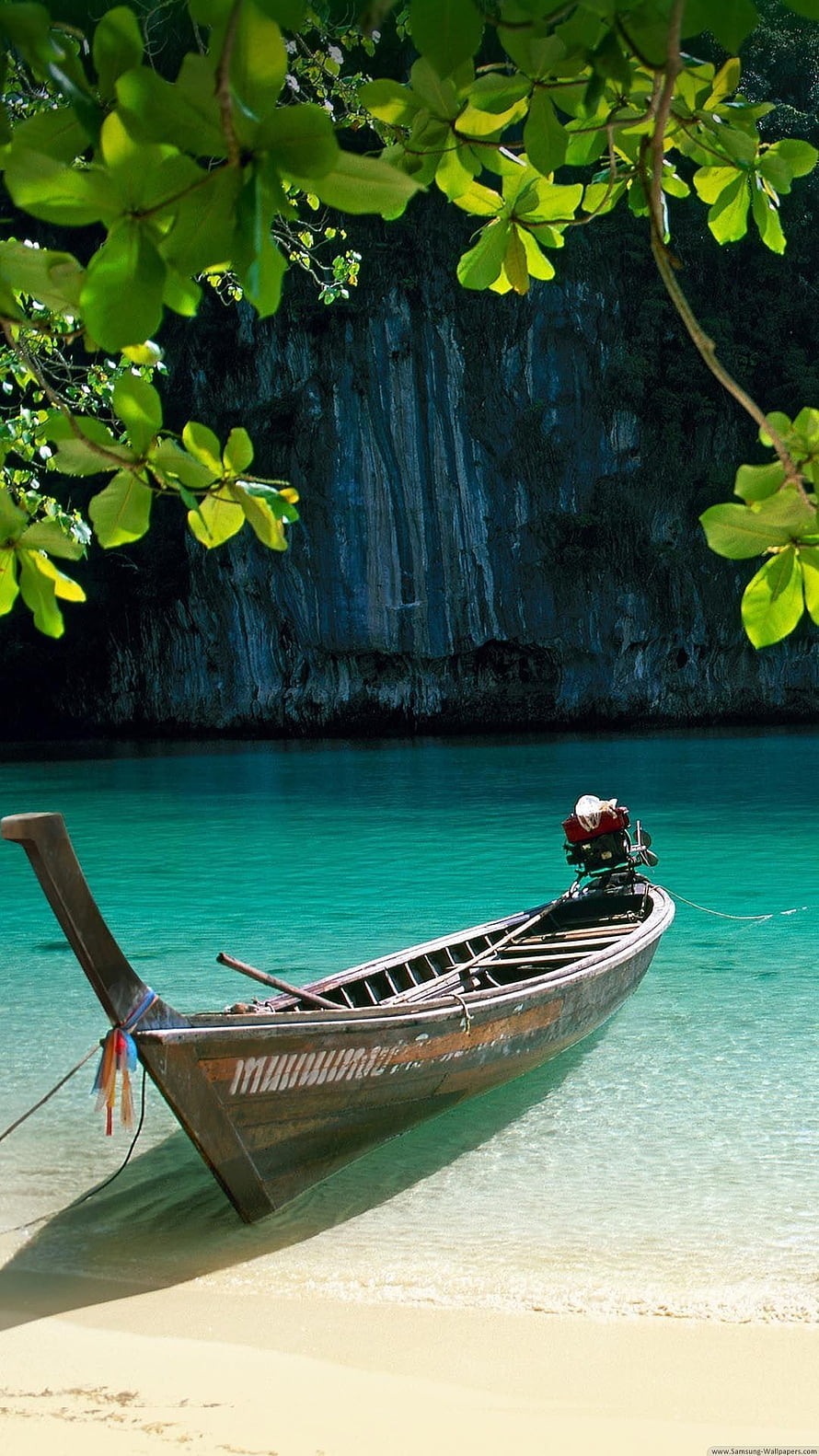 Traditional Thai Longtail Boat Moored on Turquoise Tropical Beach HD phone wallpaper