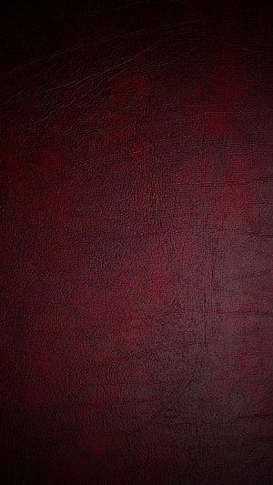 Dark Red Leather Texture Background with Subtle Grain and Vignette HD phone wallpaper